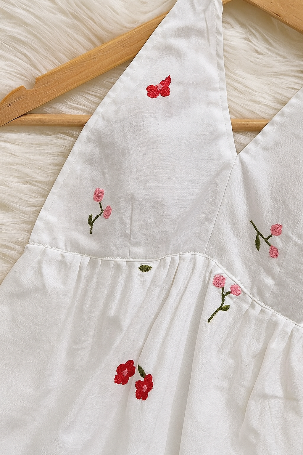 Chic & Comfy: Floral Threadwork Halter Top in White Cotton