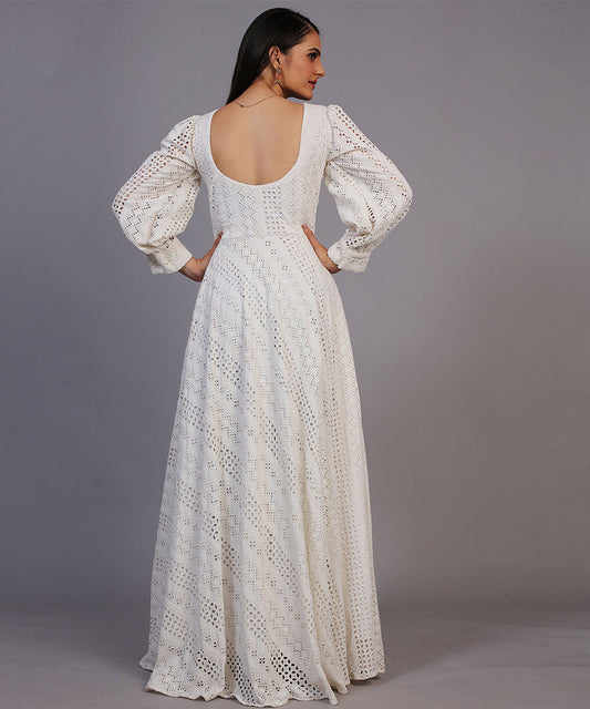 Classic off-white Lucknowi embroidered floor-length gown, showcasing timeless elegance and craftsmanship.