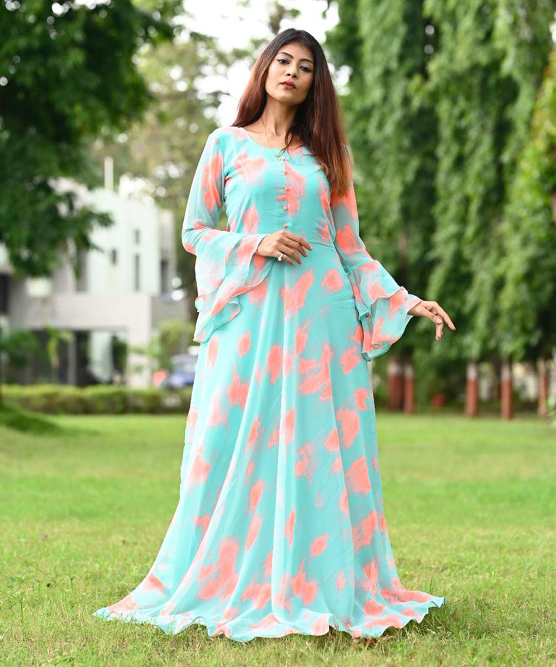 Trendy gajari pink colored partywear jacquard-tapetta gown, perfect for elegant and festive occasions.