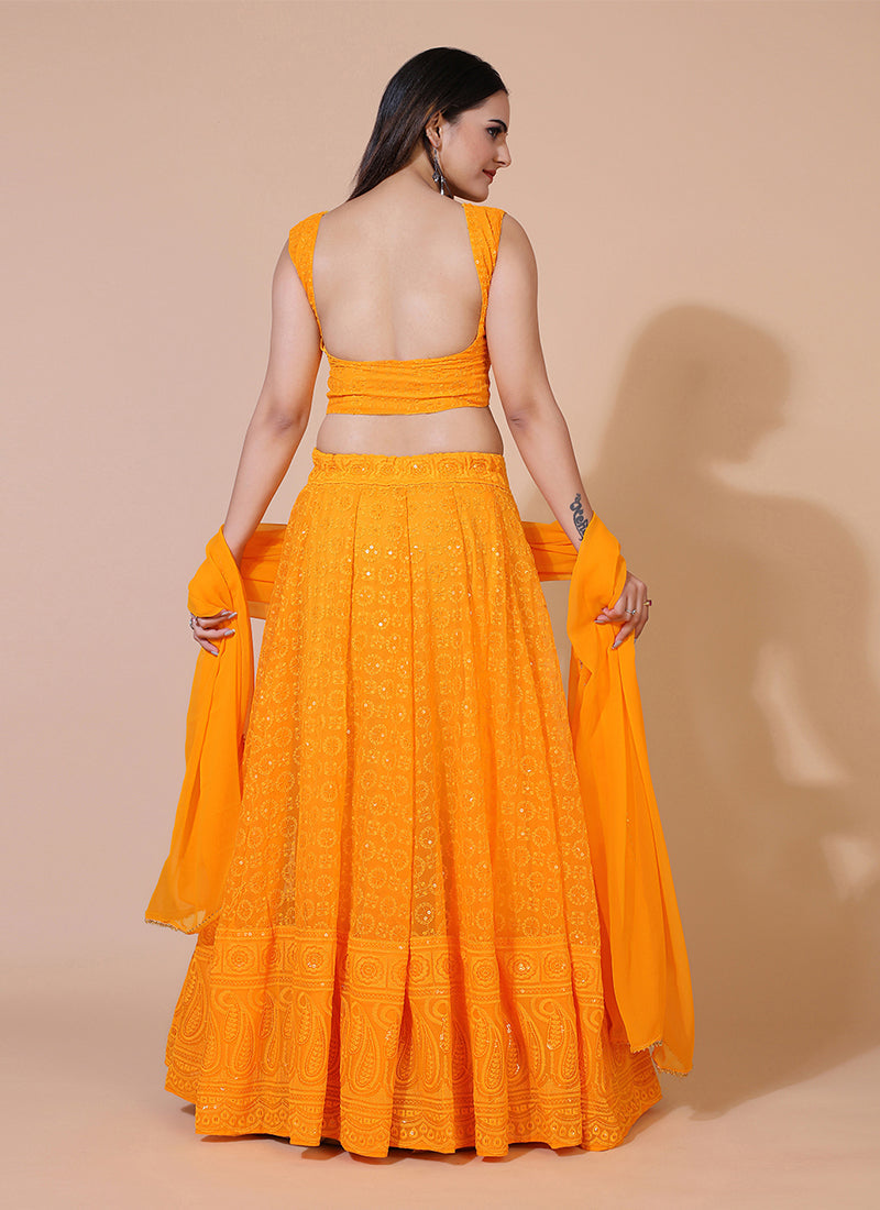 Dusty orange lehenga choli with traditional Lucknowi chikankari embroidery. tune share more_vert
