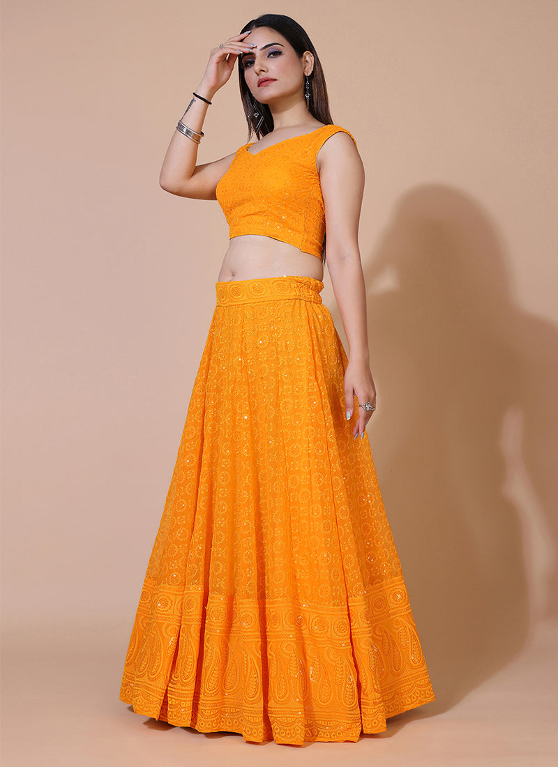 Dusty orange lehenga choli with traditional Lucknowi chikankari embroidery. tune share more_vert