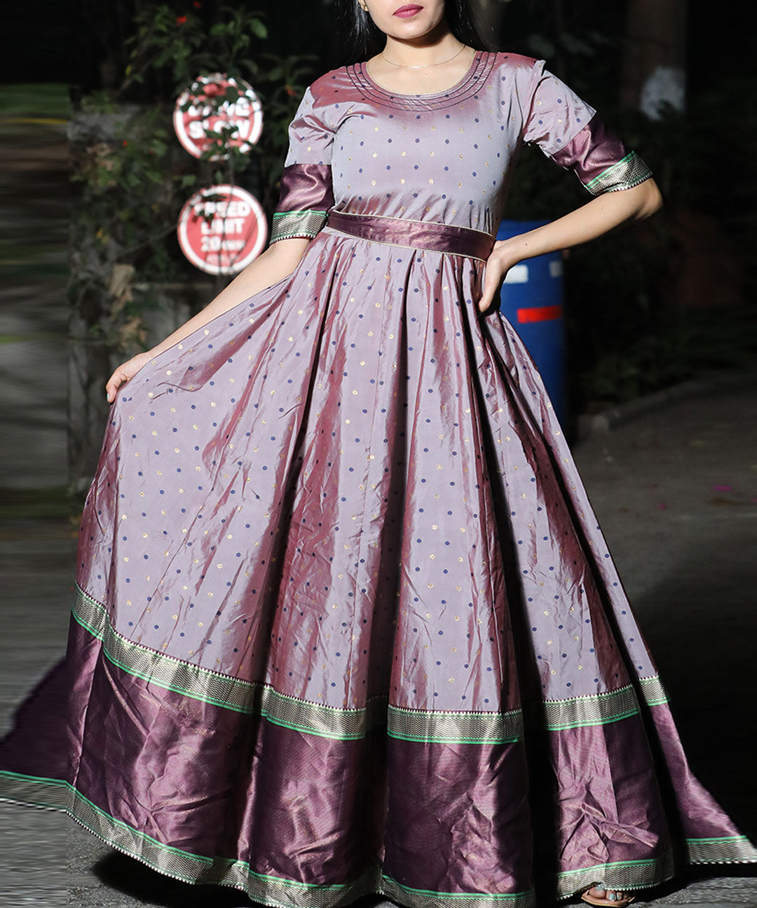Glorious grey colored festive wear gown crafted from woven Tapetta silk, perfect for elegant celebrations.