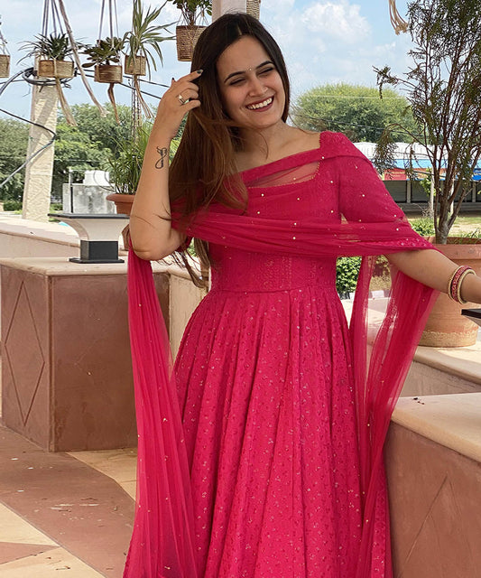 Lucknowi Chikankari embroidery on rayon partywear gown, combining traditional craftsmanship with modern elegance.