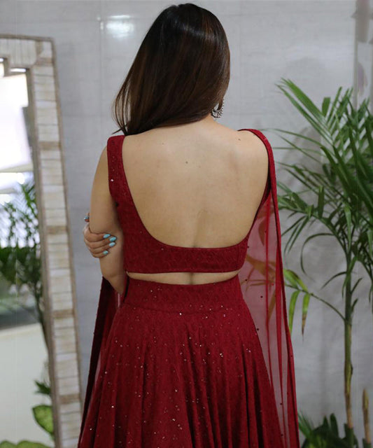 Maroon Chikankari Lehenga featuring intricate white embroidery, elegantly designed.
