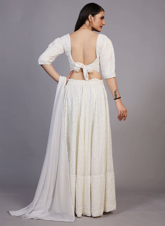 Milky white Chikankari lehenga, perfect for traditional and festive occasions with intricate embroidery.