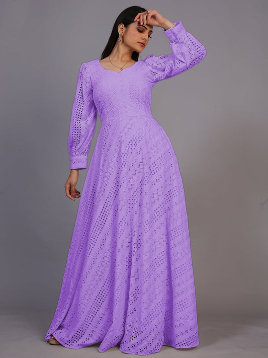 A stunning floor-length gown in rich purple, adorned with intricate Lucknowi embroidery.