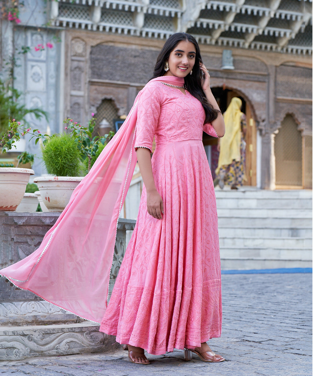 Tea rose Chikankari gown featuring intricate embroidery work