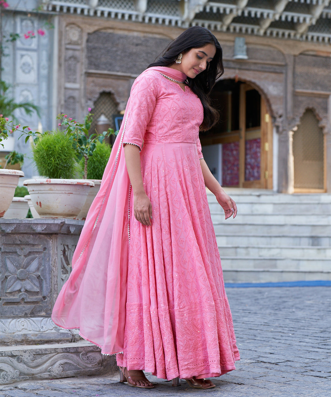 Tea rose Chikankari gown featuring intricate embroidery work