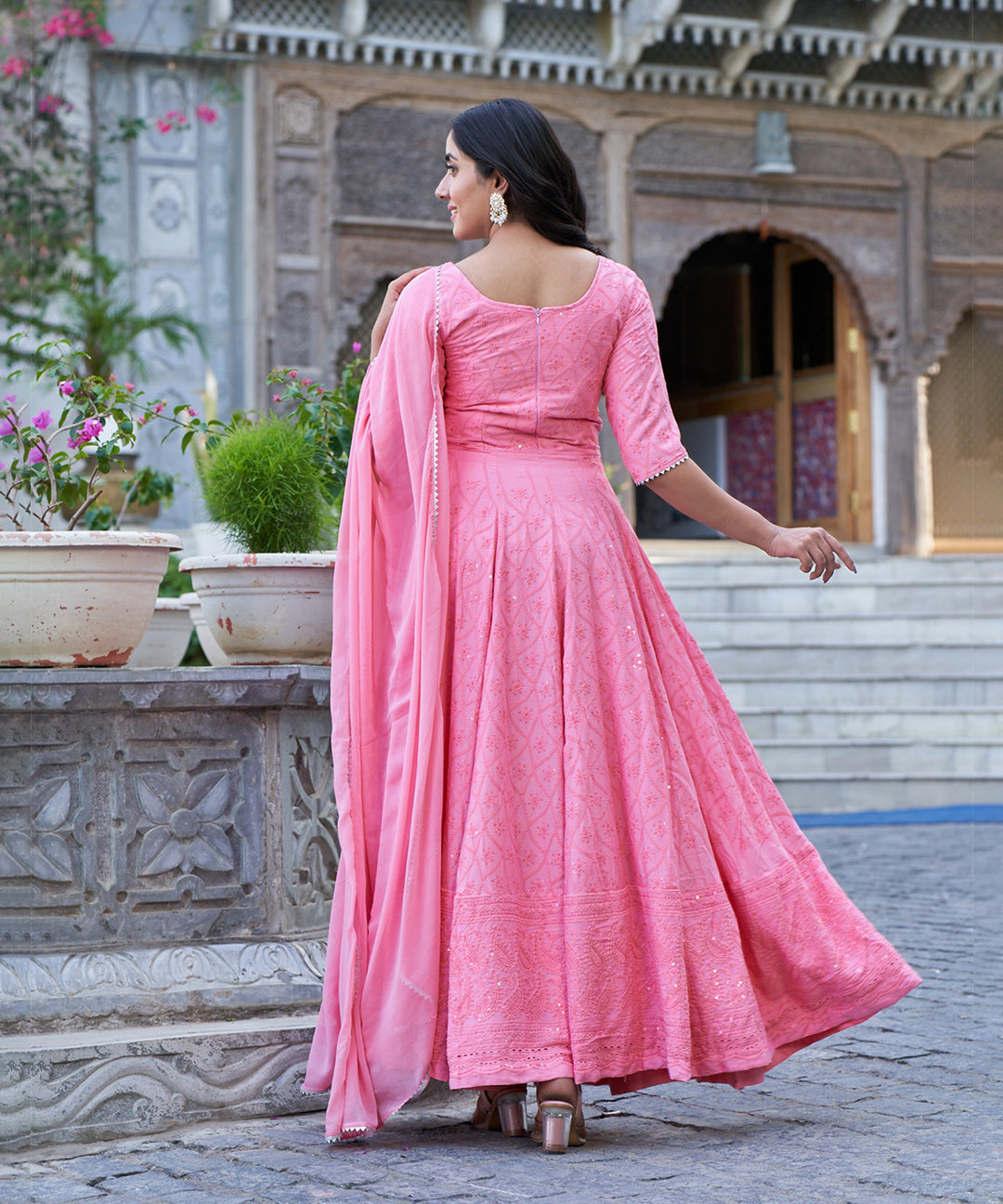Tea rose Chikankari gown featuring intricate embroidery work