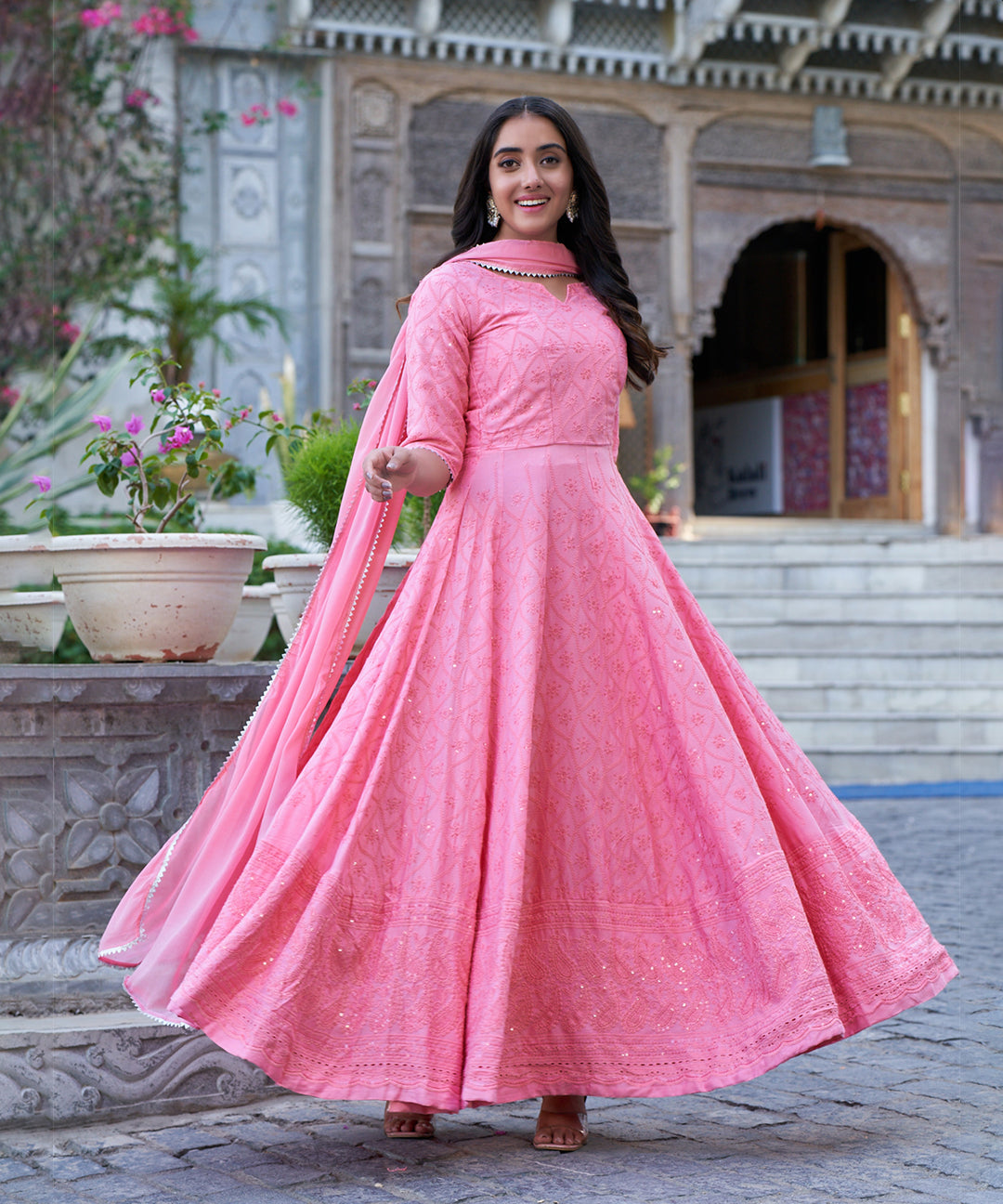 Tea rose Chikankari gown featuring intricate embroidery work