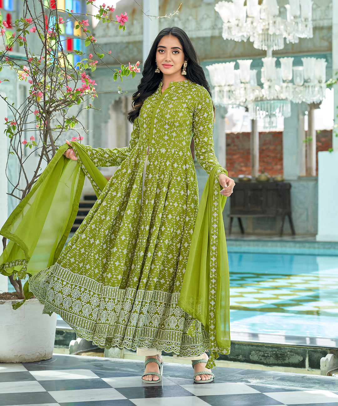 A graceful Tender Green Chikankari Suit Set, embellished with delicate chikankari embroidery for an elegant and refined appearance.
