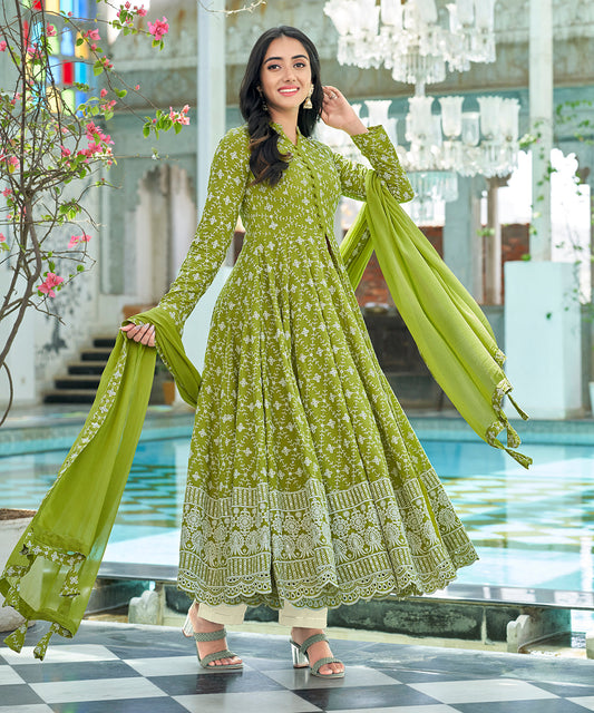 A graceful Tender Green Chikankari Suit Set, embellished with delicate chikankari embroidery for an elegant and refined appearance.