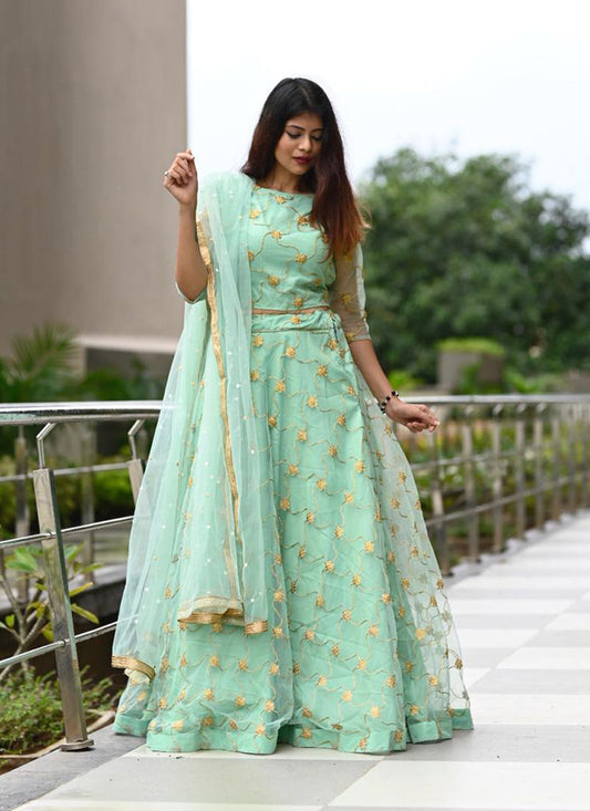 Beautiful turquoise lehenga with intricate coding embroidery. 