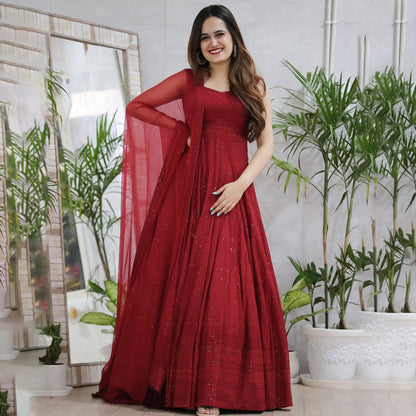 Elegant designer anarkali gown in rayon, featuring intricate Lucknowi chikankari embroidery.