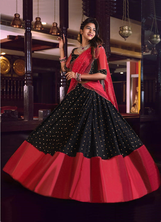 Designer black lehenga choli with elegant pearl-detailed dupatta.