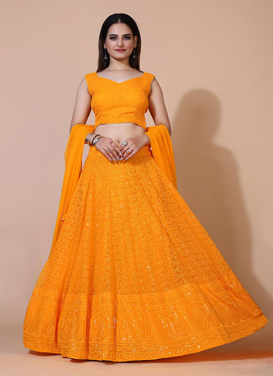 Dusty orange lehenga choli with traditional Lucknowi chikankari embroidery.     tune  share   more_vert