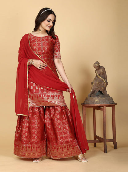 A traditional ensemble featuring a woven kurta adorned with ethnic motifs, complemented by flowing sharara pants and a matching dupatta