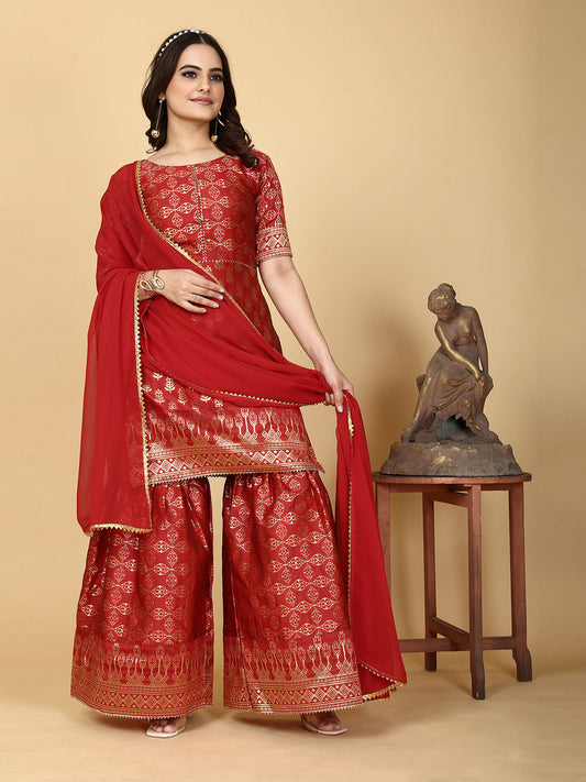 A traditional ensemble featuring a woven kurta adorned with ethnic motifs, complemented by flowing sharara pants and a matching dupatta