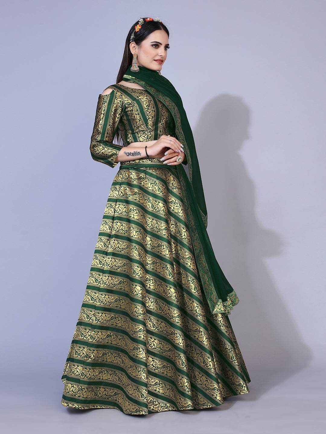 Eye-catching fluorescent green lehenga set with gold accents, ready to wear with blouse and dupatta.