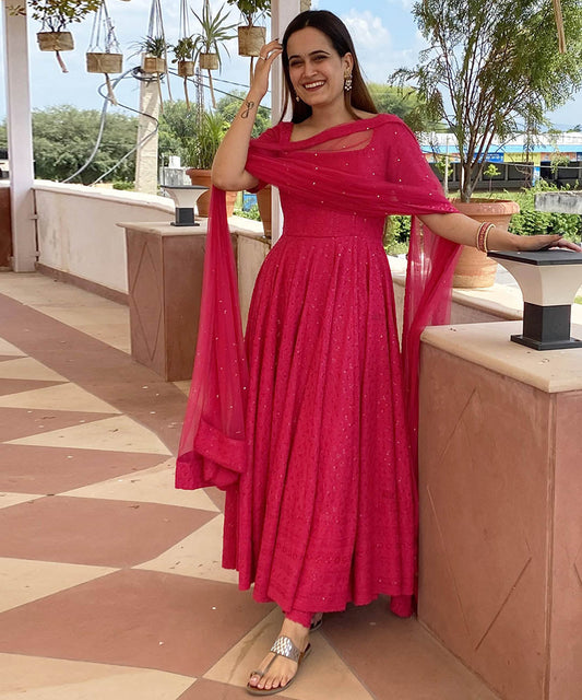 Lucknowi Chikankari embroidery on rayon partywear gown, combining traditional craftsmanship with modern elegance.