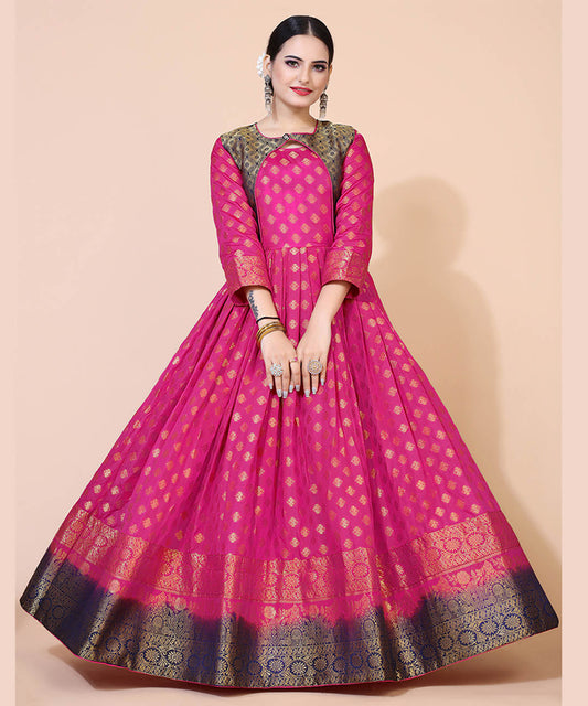 Magenta jacquard maxi dress adorned with ethnic motifs, perfect for cultural and festive occasions.