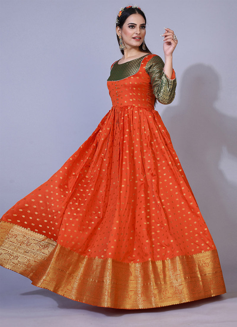 Opulent gajari pink colored partywear Tapetta gown, perfect for grand and stylish occasions.