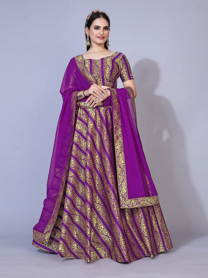A regal purple lehenga with gold-toned embellishments, paired with a ready-to-wear blouse and matching dupatta. This elegant outfit is perfect for a festive occasion.