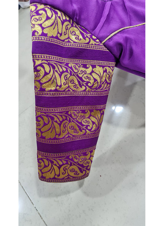 A stunning gown in a captivating shade of purple, made from flowing woven georgette for a touch of elegance and movement.