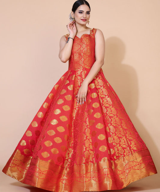 Red jacquard maxi dress adorned with ethnic motifs, perfect for cultural and festive occasions.