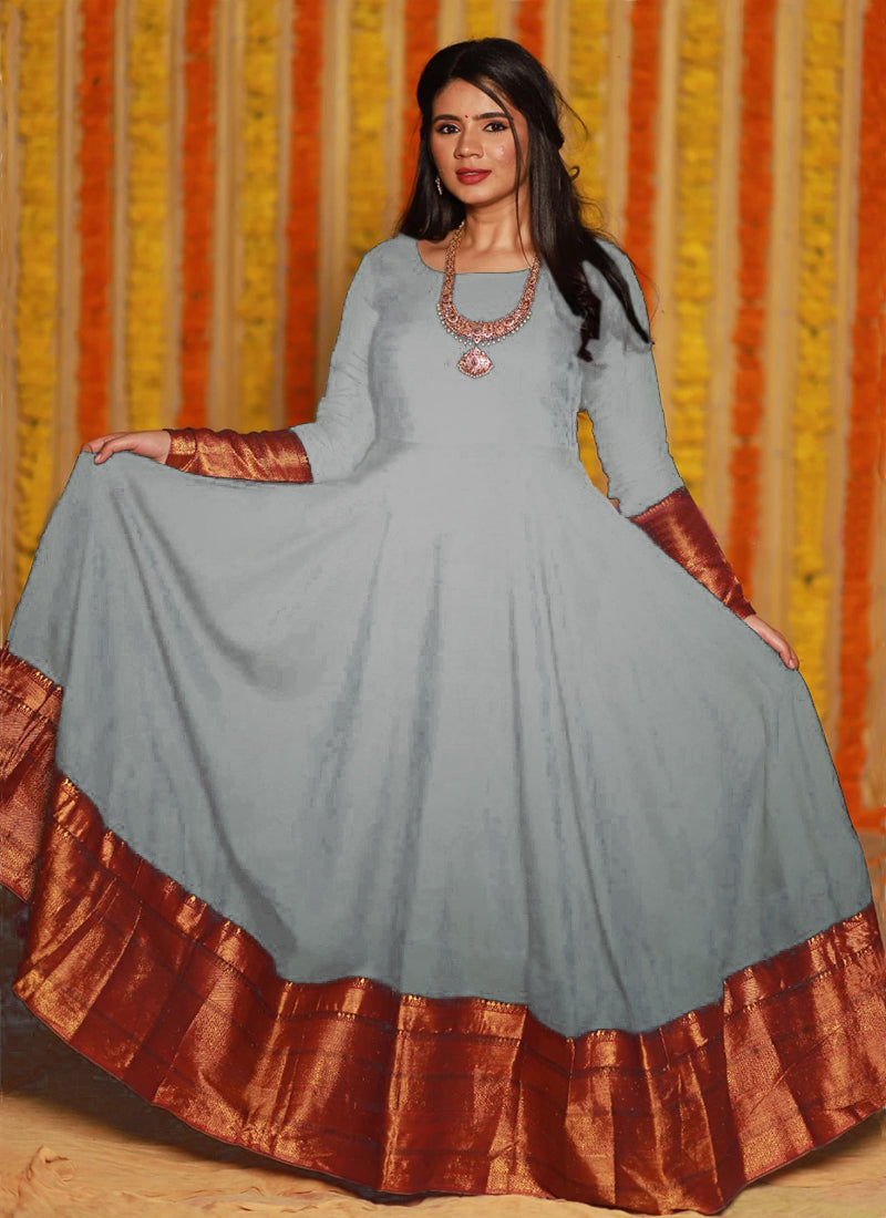 Chic light grey party wear woven georgette gown offering a refreshing look ideal for elegant occasions.