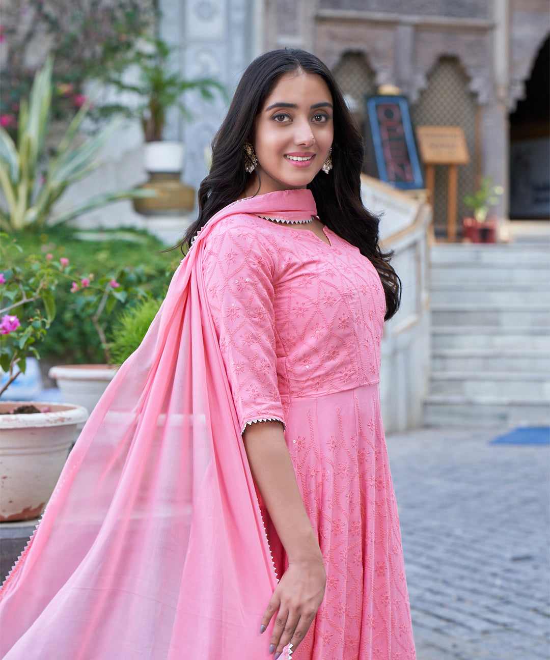 Tea rose Chikankari gown featuring intricate embroidery work