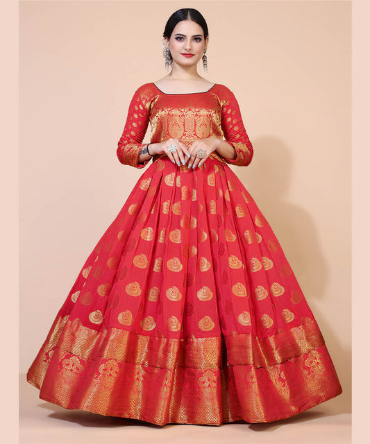 Women's red and gold-toned jacquard maxi dress adorned with ethnic motifs, perfect for cultural and festive occasions.
